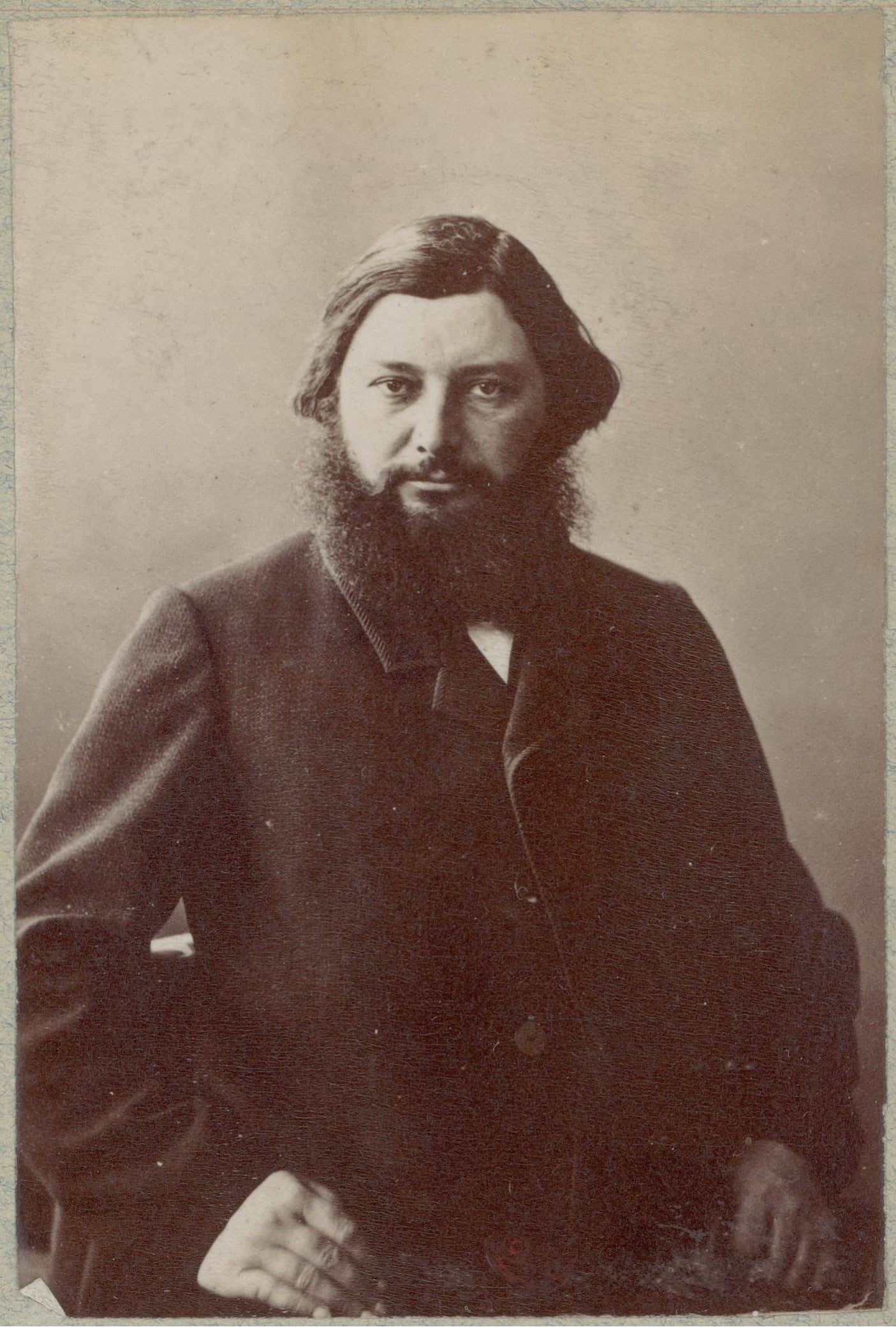 Gustave Courbet photographed in Nadar’s studio during the 1860s.