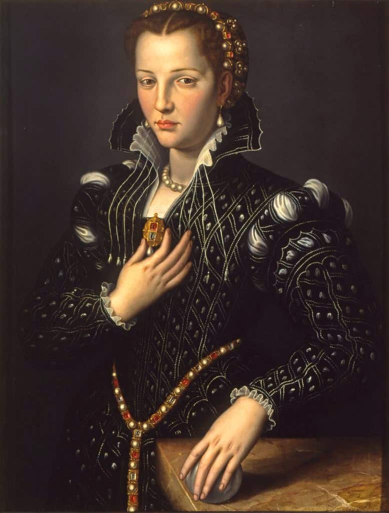 Lucrezia de’ Medici appears in black court dress and pearl jewelry in the portrait now attributed to Alessandro Allori.